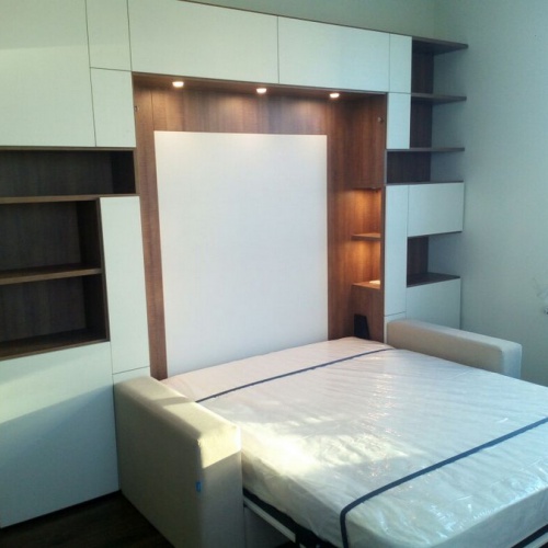 White bed-wardrobe with light