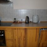 Large home-made kitchen from wooden boards