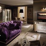 Purple sofa - a bright element of the living room
