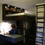 Boy's room with wooden loft bed