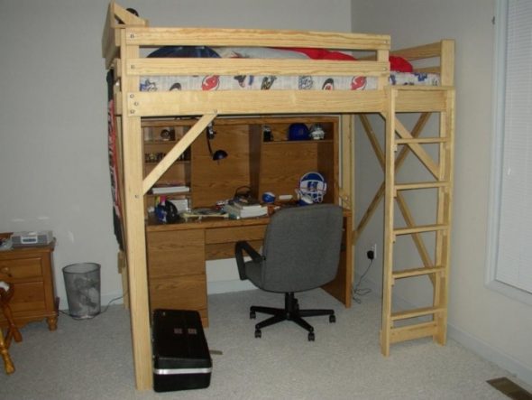 Loft bed with built-in table downstairs