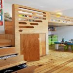 Loft bed with work area and built-in wardrobe