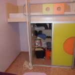 Bed over wardrobe from chipboard