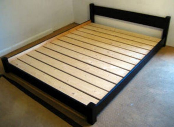 Bed from a chipboard with lamels