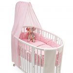 Cot for baby with the protection of large peas