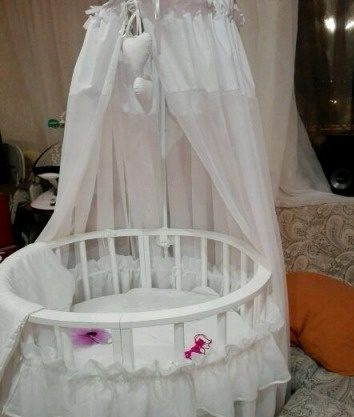 Round white canopy bed