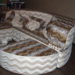 Round leopard sofa in the interior