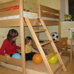 Small wooden bed for the nursery