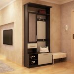 Cabinet with mirror and ottoman in a small corridor