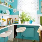 Modern turquoise kitchen with a table - bar counter
