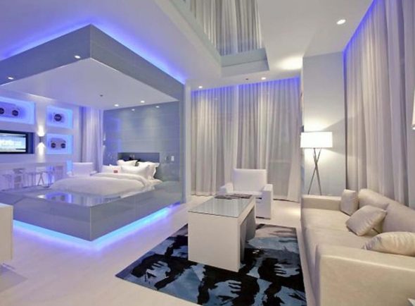 חדר שינה עם סלון עם מיטת מיטה