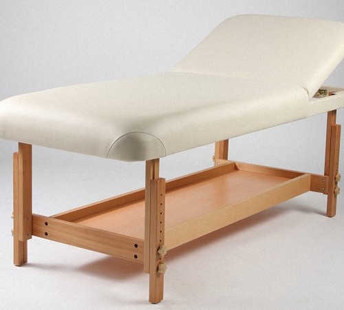 White stationary massage table