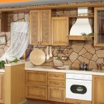 Stylish wooden kitchen with decor