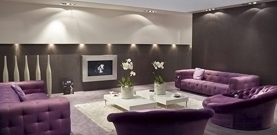 Dark lilac sofas in a spacious room