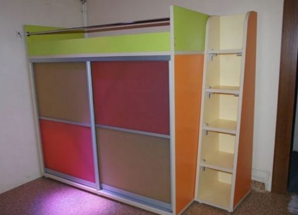 Bright bed with a multi-colored wardrobe