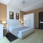 Vita möbler med en kort design i sovrummets inre, gjorda i minimalismens stil