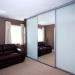 White wardrobe with a mirror door for the living room