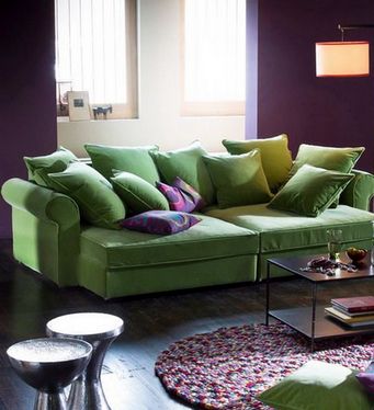 Color sofa is introduced into the interior of a different color.