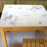 Wooden table after decoupage