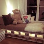 Children's sofa with lighting at the window