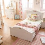 Beautiful tender bedroom with a comfortable bed for a teenager girl