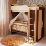 Bed in two tiers for a large child and baby