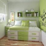 Small bed-podium in white and green colors