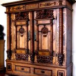 Massive carved wooden cabinet