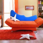 Składana sofa pomarańczowa