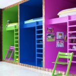 Separating cots and play spaces with color