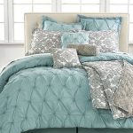Silver turquoise decor for beige bed