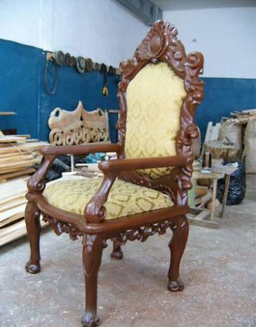 Chair with embossed carvings