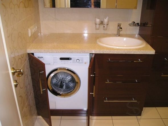 Maginhawang cabinet para sa washing machine