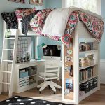 White wooden bunk bed with work desk