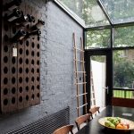 Bottles on a wooden shelf in the wall