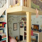 Children's loft bed with desk and play area