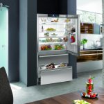 The door of the cabinet, if desired, can be combined with the door of the refrigerator