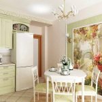 Beautiful picture on the wall adds comfort and brightness to the pretty kitchen.
