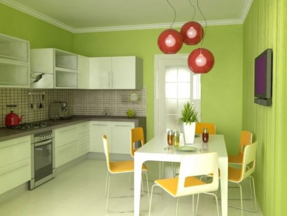Kitchen in shades of green with bright accents