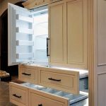 Kitchen cabinet with different compartments