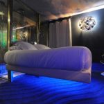 Unusual suspended bed with light