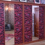 Pasting wardrobe with wallpaper for interior renovation