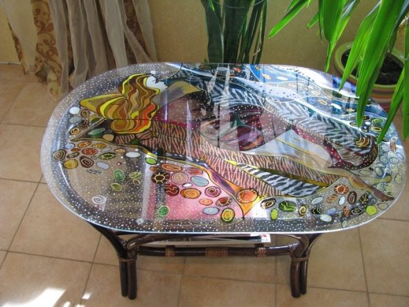 Dining table in reverse decoupage technique