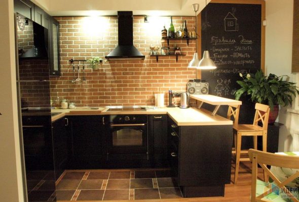 Original loft-style kitchen with black furniture