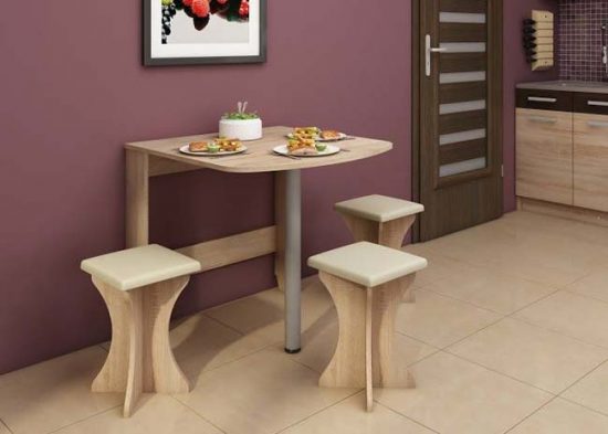 Folding table with fastening to the wall