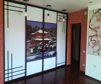 Sliding wardrobe in a niche with winter landscapes