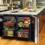 Built-in fridge for vegetables and fruits in the island kitchen