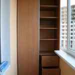 Tall cabinet with shelves and drawers