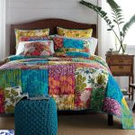 Bright, often quilted patchwork bedspread