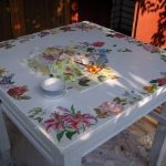 White wooden table in decoupage technique